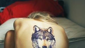 Wolf tattoo meaning for guys on arm